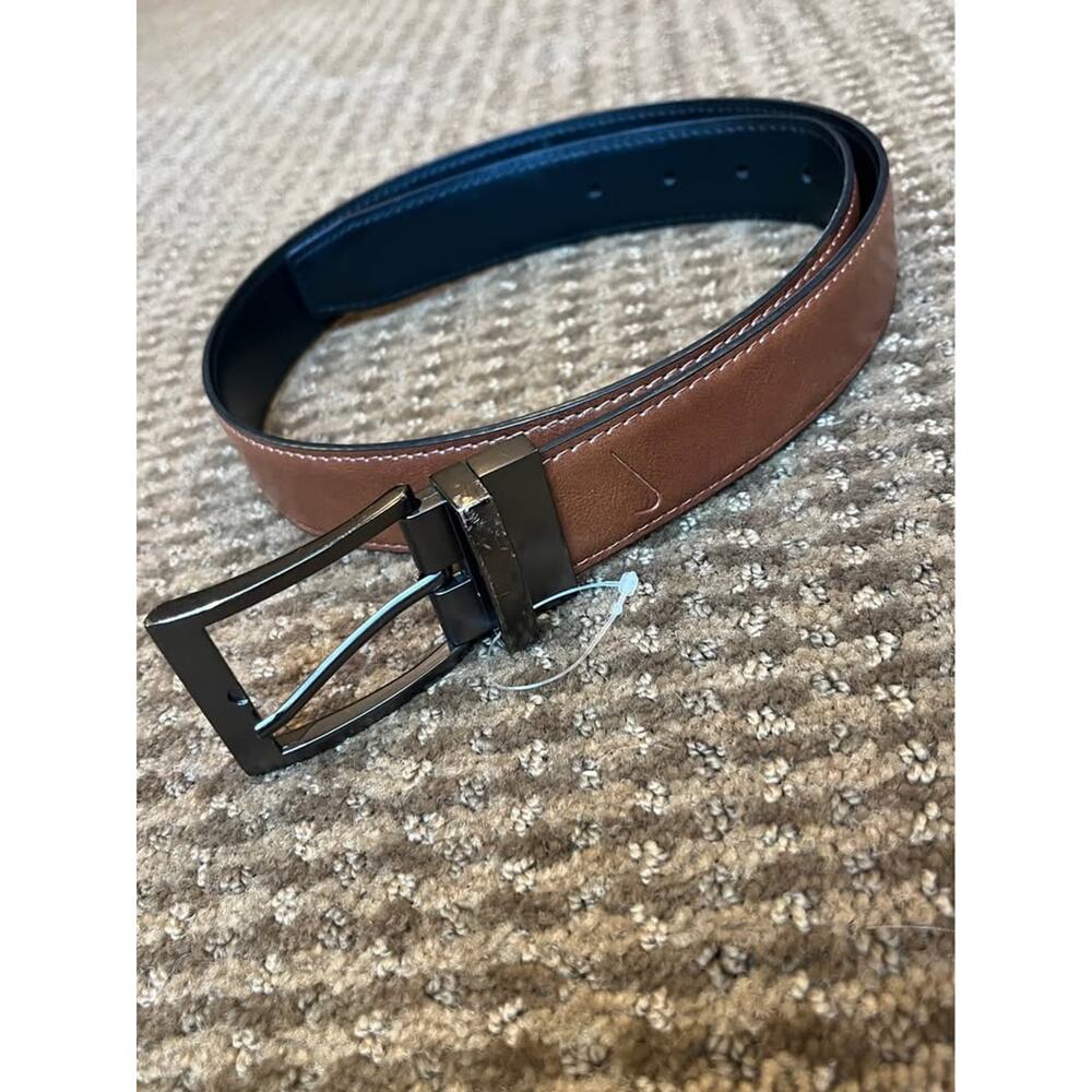 Nike synthetic leather belt size Small. 40”L. BNWOT!